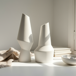 https://cdn.shopify.com/s/files/1/2596/6404/files/editorial-composition-with-sculptural-ceramic-vases.png?v=1761582753
