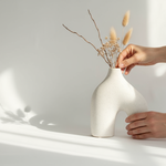 https://cdn.shopify.com/s/files/1/2596/6404/files/jarr-n-colos-with-dried-flowers-being-arranged.png?v=1761331504
